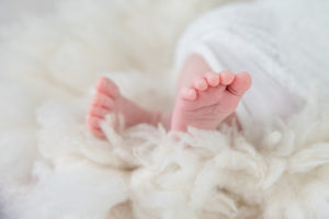 Close up of newborn baby feet.